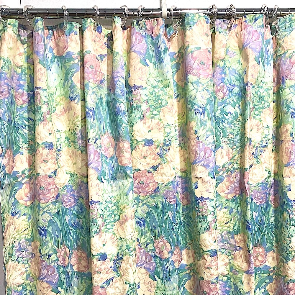 2 Floral Patterned Shower Curtains plus 5 sets of shower curtain hooks